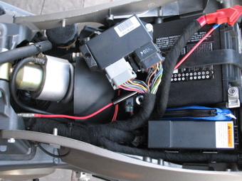 Fuse and wire routed under seat