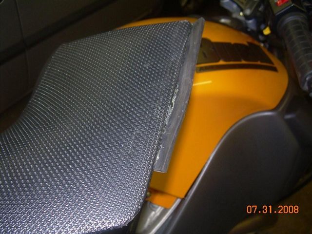Rubber gasket glued to seat