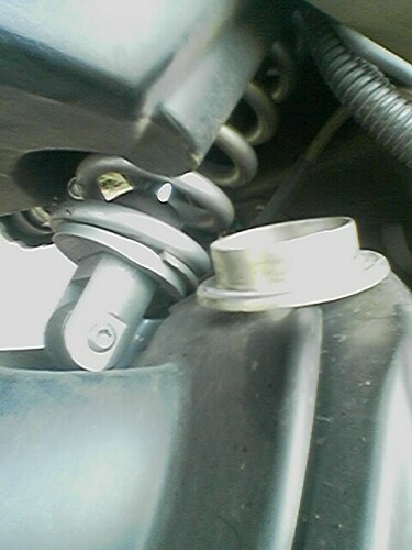 lowering spring retainer new and old