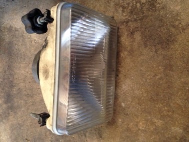 S3T headlight, has loose piece on inside, 1 adjustment knob, $20 shipped in usa