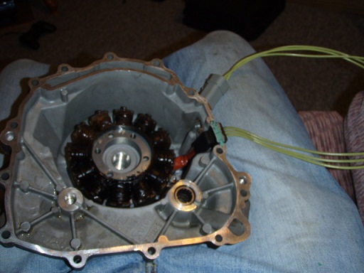 the stator in the cover with its wires