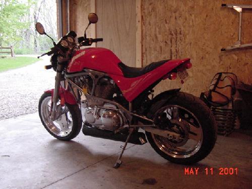 Heres a pic of my new toy I just stole, 800 miles and stock!  After 1 year on a Road Queen I am back in the saddle again!