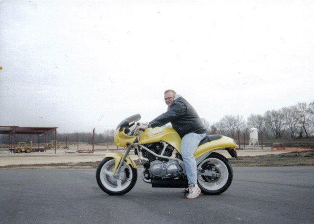 Yellow S2 prototype with 2815 Buell Drive in the background 2